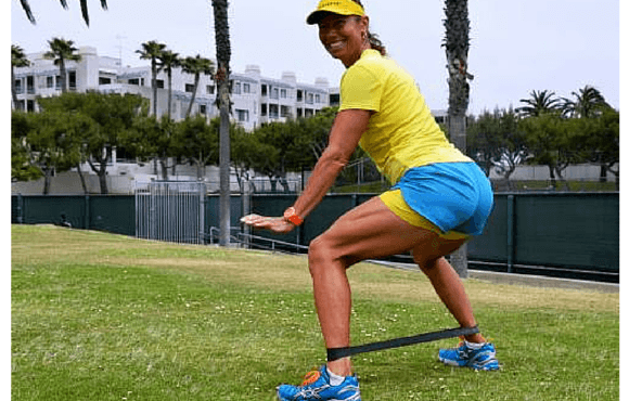Strengthen the glutes with monster walk (lateral band walk)